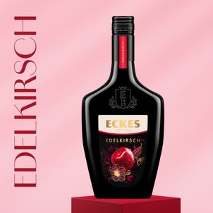 Vor einem pastellrosa Hintergrund präsentiert sich die schwarze Flasche mit dem Schriftzug 'Eckes seit 1857' in goldener Schrift.
